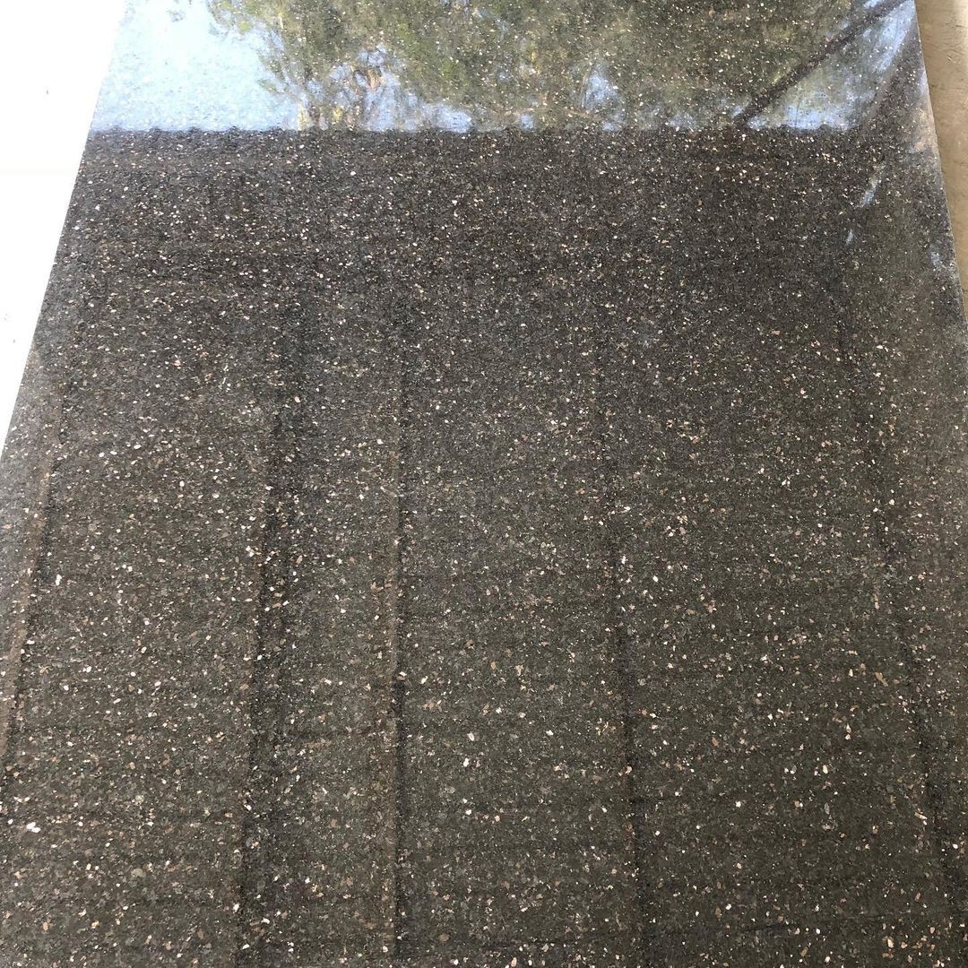 Black galaxy granite slab close up