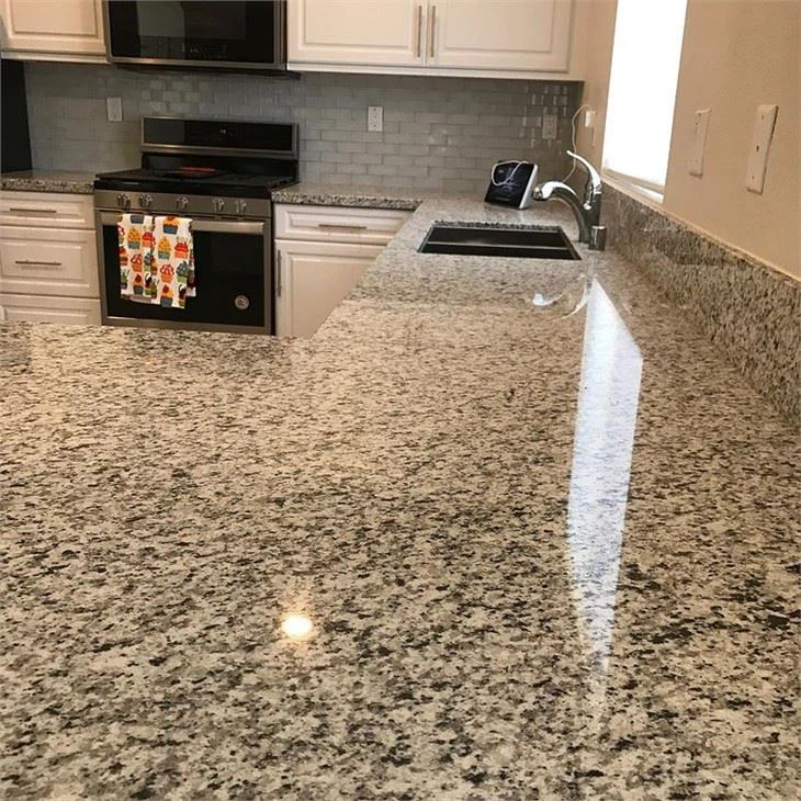 Bianco taupe granite table